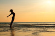 silhouette of woman on the sea