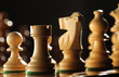 Chess pieces ready to do battle.
