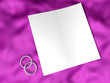 white paper and wedding ring