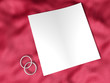 white paper and wedding ring