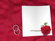 white paper and wedding ring