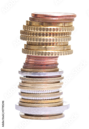 Photo: Stack of coins isolated on white. Stack of coins isolated on white.
