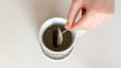 A cup of brewed black tea in a bag. HD H.264 A cup of brewed black tea in a bag. HD H.264
