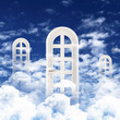White door against blue sky background White door against blue sky background