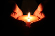 Candle between hands Candle between hands