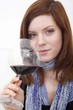 young woman drinking red wine