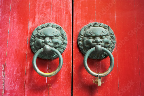 Photo: Chinese red gate doors with lion door knob Chinese red gate doors with lion door knob