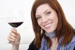 young woman with red wine