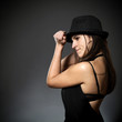Beautiful young woman with hat