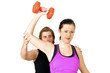 Photo: Gym woman with trainer Gym woman with trainer