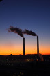 Smoking factory chimneys. Sunrise.