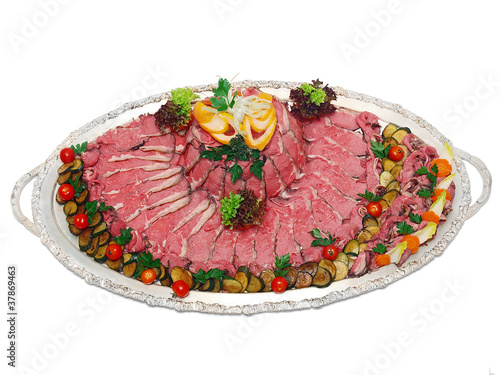 Photo: roast beef on silver platter roast beef on silver platter