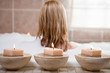 Back of a woman enjoying turkish bath