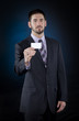 male holding business card