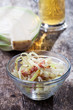Bayerischer Krautsalat in eine Glasschale Bayerischer Krautsalat in eine Glasschale