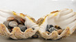 Decoration in a bathroom: shells with stones