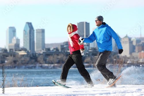 Photo: Winter couple fun on snowshoe in Montreal Winter couple fun on snowshoe in Montreal