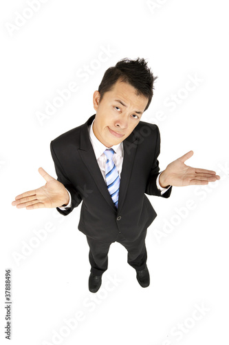 Photo: businessman shrugging businessman shrugging