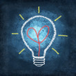 heart in light bulb drawing by chalk