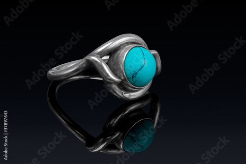 Photo: Silver ring with stone turkiz with reflection. Silver ring with stone turkiz with reflection.