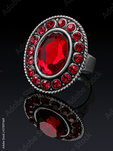 Photo: Silver ring with red stones ruby with reflection. Silver ring with red stones ruby with reflection.