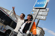 couple calling taxi