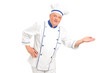 Photo: Portrait of smiling chef gesturing welcome Portrait of smiling chef gesturing welcome