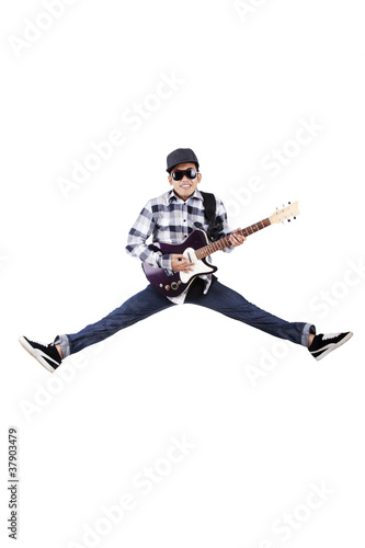 Photo: Guy plays guitar Guy plays guitar