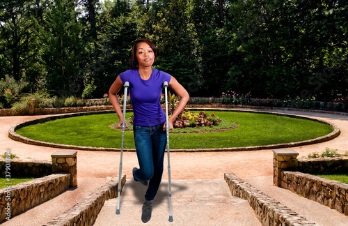 Photo: Black Woman on Crutches Black Woman on Crutches