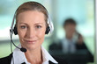 Woman smiling with headset