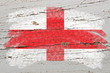 flag of england on grunge wooden texture painted with chalk