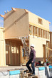 Builder walking around a construction site