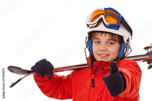 Photo: Optimistischer Junge mit Skihelm - Daumen hoch Optimistischer Junge mit Skihelm - Daumen hoch