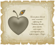 Apple in form of heart on old vintage sheet