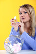 Woman eating marshmallow