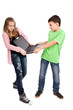 Children fighting over a laptop