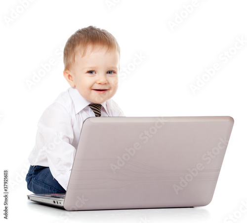 Photo: Child using a laptop Child using a laptop