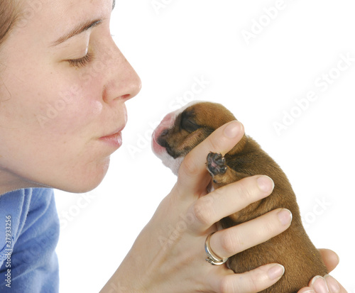 Photo: woman and newborn puppy woman and newborn puppy