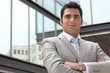 Smart executive outside an office building