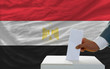 man voting on elections in egypt in front of flag man voting on elections in egypt in front of flag