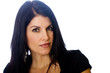 Foto: Beautiful middle aged woman with a stern expression Beautiful middle aged woman with a stern expression