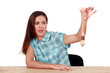 Disgusted woman holding a paintbrush