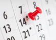 Photo: punaise rouge sur un calendrier 14 punaise rouge sur un calendrier 14
