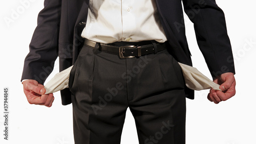 Photo: Uomo con le tasche vuote Uomo con le tasche vuote