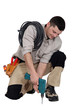craftsman working with a drill