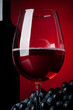 A glass full of wine and bottle