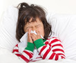 Child in Bed with Cold Sneezing