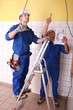 craftsman giving instructions to his apprentice