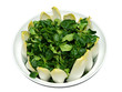 a bowl of leafy green vegetables