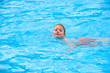 boy is swimming